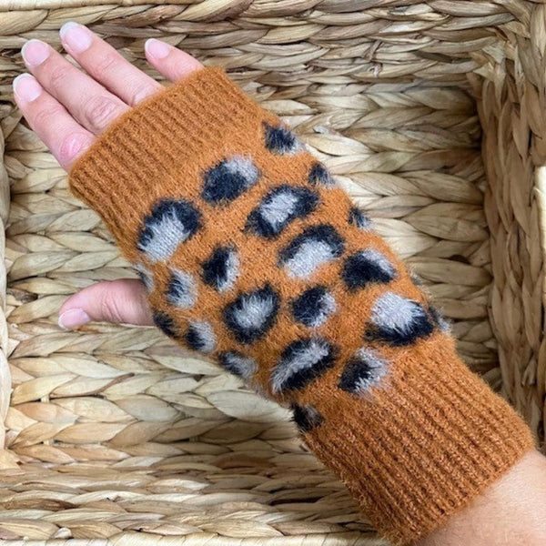 The Amie Leopard Print Wrist Warmer Gloves Rust will keep you cosy, warm and looking fabulous