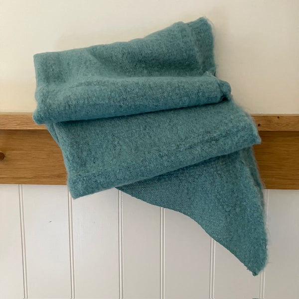 The Jenn Bouclé Knitted Scarf Duck Egg Green is super soft, cosy and ideal for when the weather gets cold