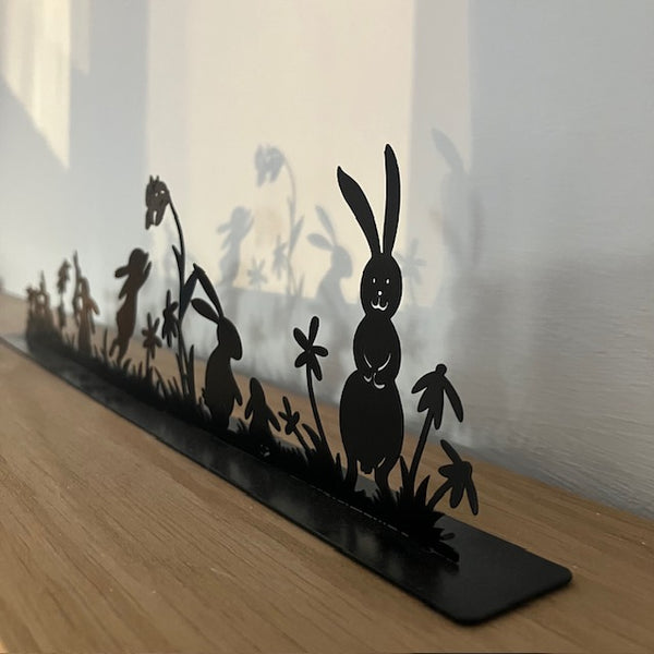 The Bunny Metal Silhouette Decoration is a unique and charming bunny scene, ideal to add to your cosy nest's home decor