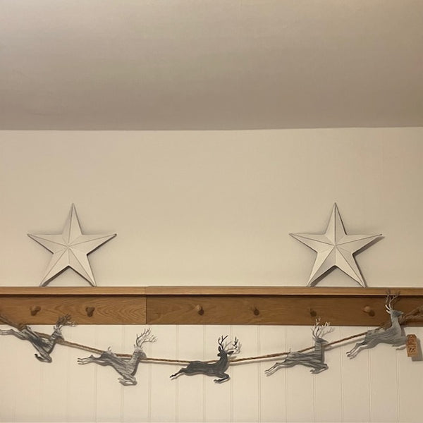 Add this stunning Rustic Reindeer Rope Garland to your cosy home at Christmas time.