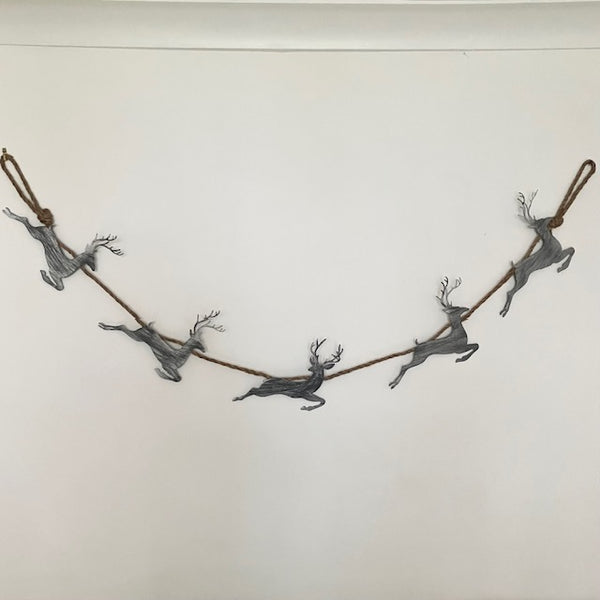 Add this stunning Rustic Reindeer Rope Garland to your cosy home at Christmas time.