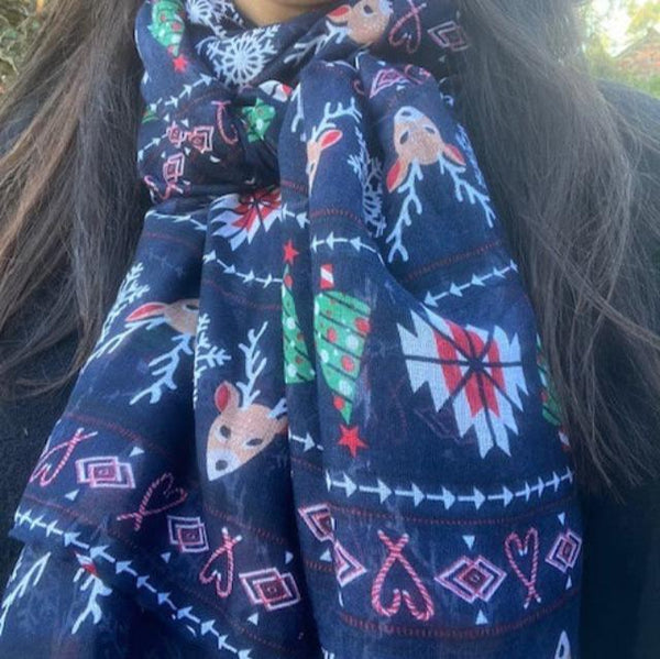 The Noelle Scarf Navy is the perfect Christmas accessory for the festive season