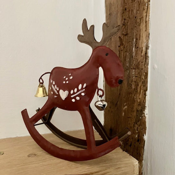 Metal reindeer that rocks with pretty Scandinavian paintwork design and bells