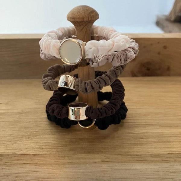 Scrunchie Hair Tie Bracelets Neutral Pack is an ideal cosy accessory to keep on your wrist for when you need to pop your hair up