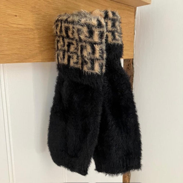 The Tess Fingerless Gloves Black are fabulously soft, fluffy and incredibly stylish