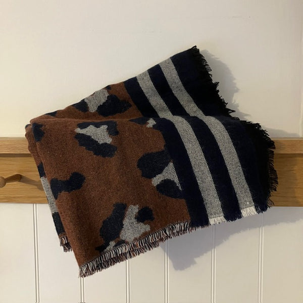 The Wangari Scarf Brown is the perfect statement blanket scarf that will keep you super cosy and warm