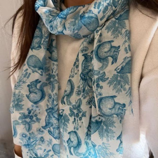 The Cottage Wildlife Scarf Teal is a cosy British cottage garden print including wildlife