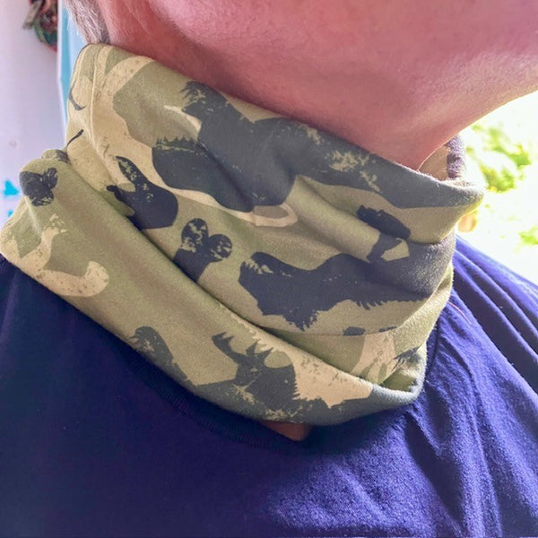 Abella Snood Dinosaurs Green keeps the neck area warm, snug and cosy