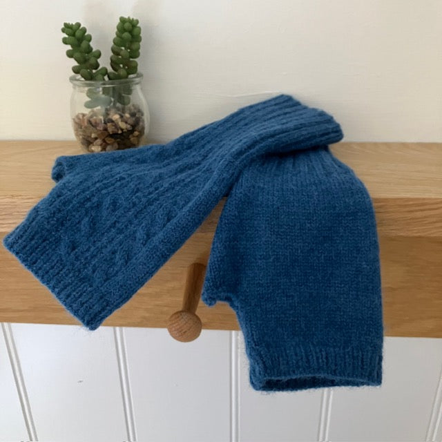 The Agnes Knitted Wrist Warmer Gloves Denim are a super stylish and cosy accessory if you want all your fingers free, but still have lovely warm hands