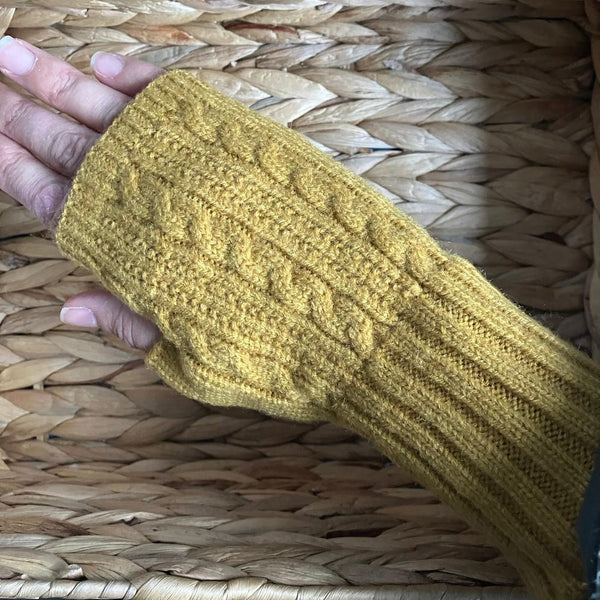 Agnes Knitted Wrist Warmer Gloves Mustard are a super stylish and cosy  fingerless gloves