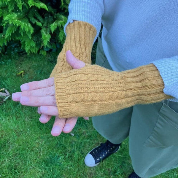 Agnes Knitted Wrist Warmer Gloves Mustard are a super stylish and cosy  fingerless gloves