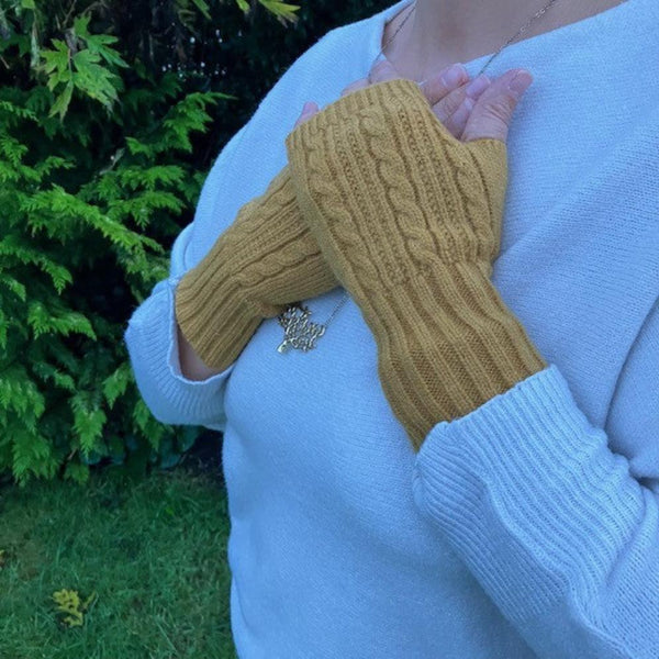 Agnes Knitted Wrist Warmer Gloves Mustard are a super stylish and cosy  fingerless gloves