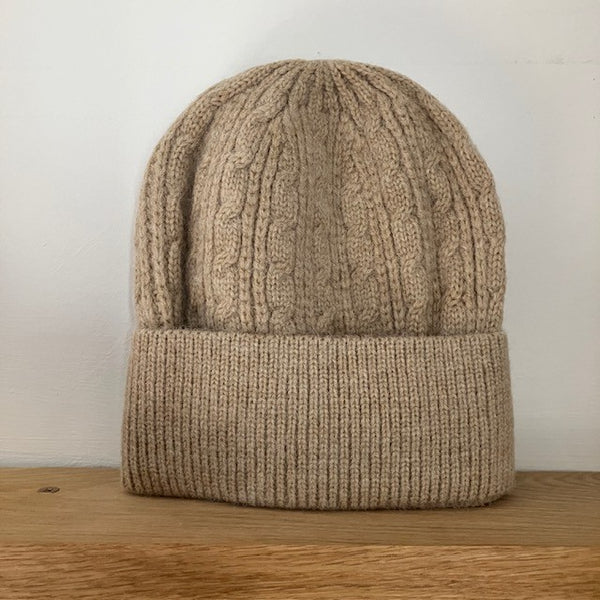 The Agnes Hat has a good stretch and a knitted pattern