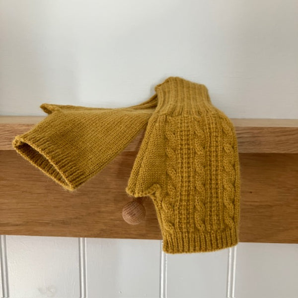 The Agnes Fingerless Gloves keep hands warm and cosy