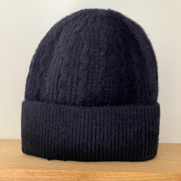 The Agnes Hat has a good stretch and a knitted pattern