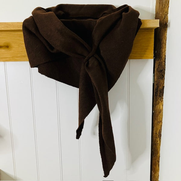 The Aida Scarf Brown in this on-trend triangular shape is the versatile must have accessory of the season