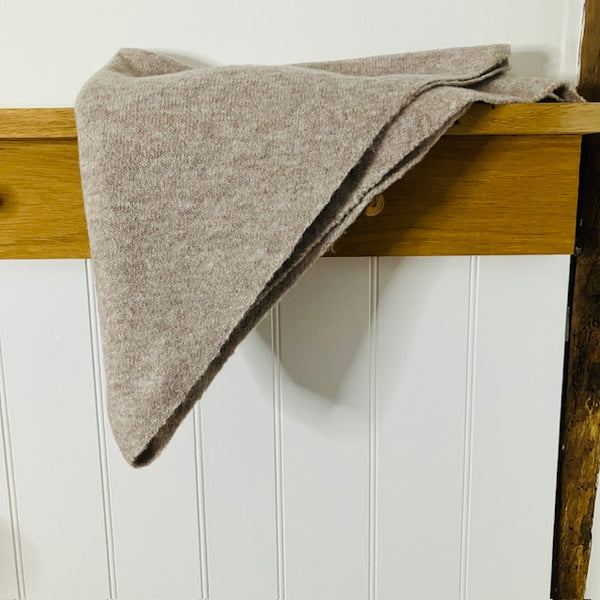 The Aida Scarf Natural in this on-trend triangular shape is the must have accessory of the season 