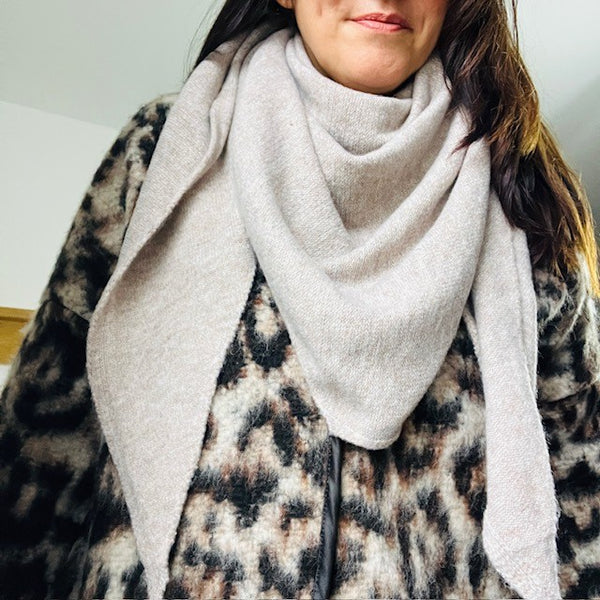 The Aida Scarf Natural can also be worn as a cosy snood