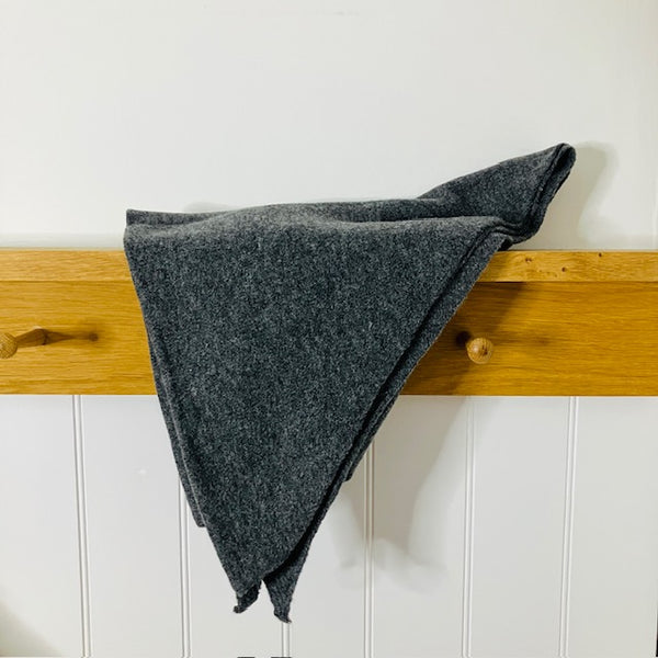 The Aida Scarf Grey is an on trend triangular shape