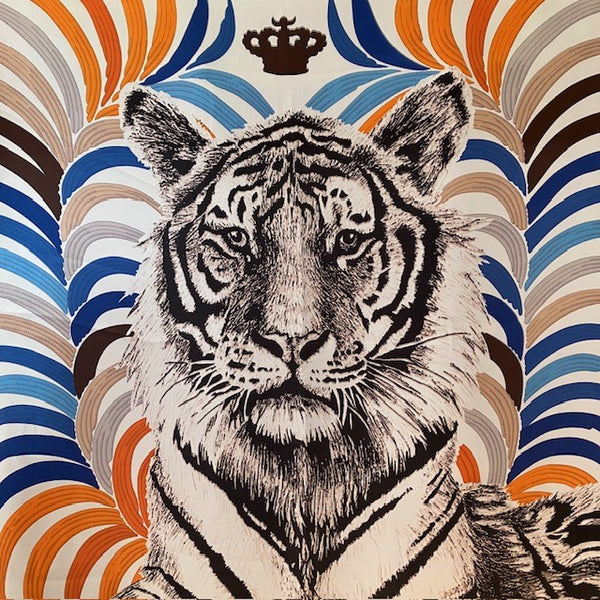 The Babar Scarf has a stunning tiger's face as the central print