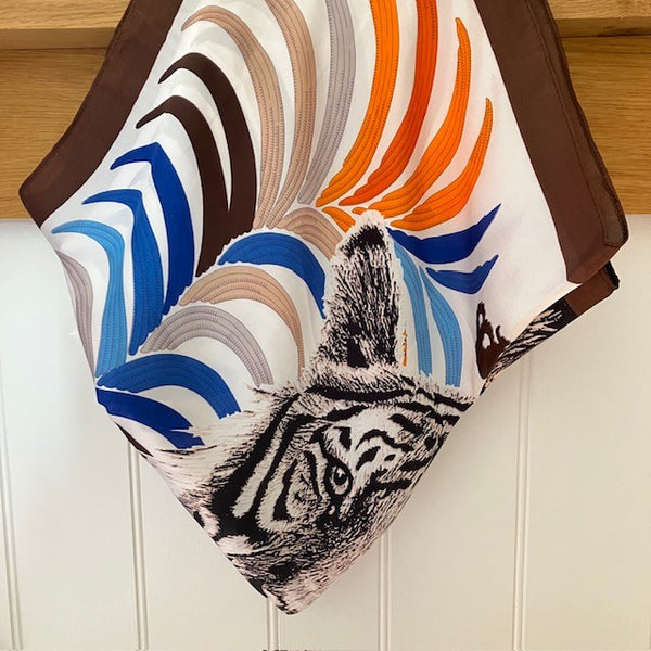 The Babar Scarf is made out of polyester and has a silk feel.