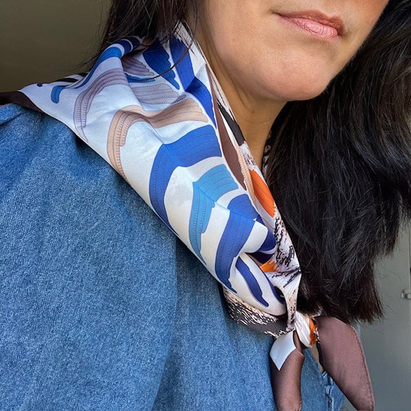 The Babar Scarf Brown is ideal for styling into the on-trend triangle tied scarves.