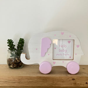 Ideal New Baby gift of a moveable elephant shaped photo frame in pink.  Also available in blue.