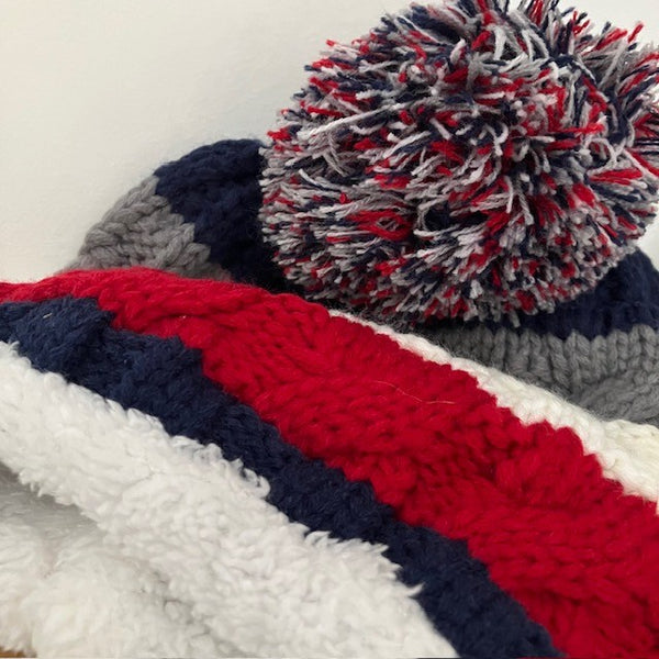 The Bailey Hat Navy & Red is a super warm and cosy insulated hat, ideal for cold weather