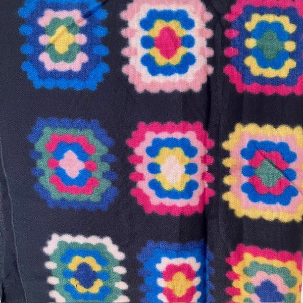 The Betsy Scarf has granny square crochet effect pattern