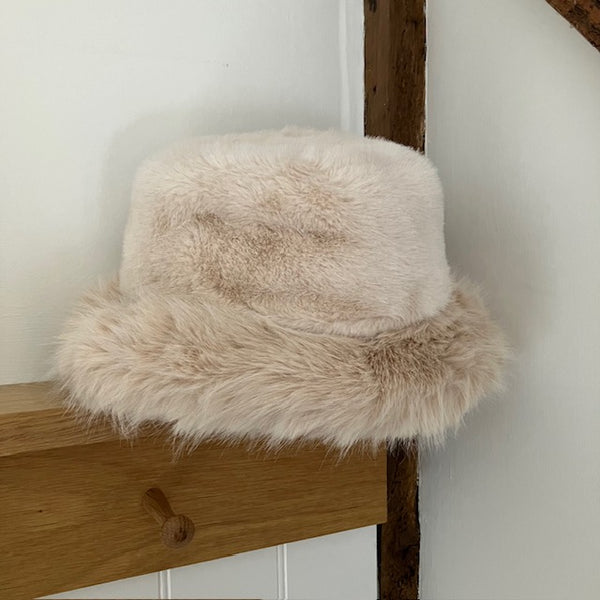 The Bianca Hat Cream is a stunning on trend faux fur bucket hat