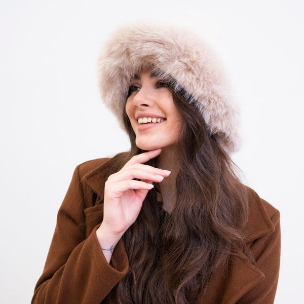 The Bianca Hat Cream is a stunning on trend faux fur bucket hat