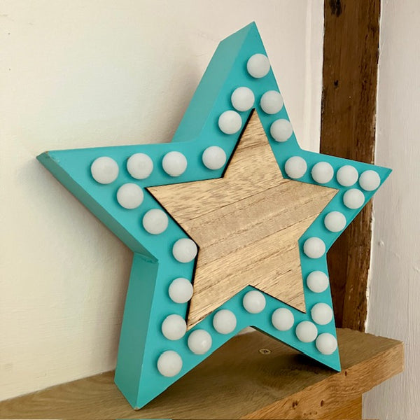 The Blue Star Light is made from wood