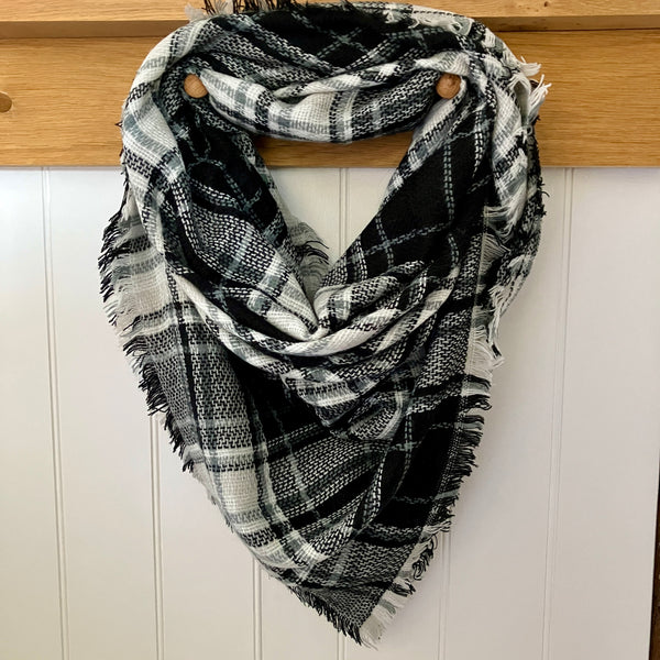 The Bonnie Scarf Black & White is a fabulous blanket scarf ideal for wrapping up in, all snug and warm, on a cold chilli day