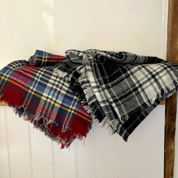 The Bonnie Scarf is available in Burgundy Red or Black and White