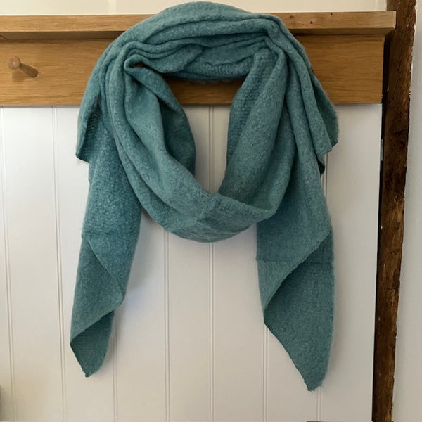 The Jenn Bouclé Knitted Scarf Duck Egg Green is super soft, cosy and ideal for when the weather gets cold