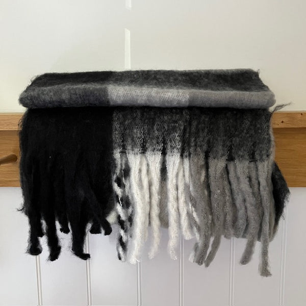 The Bowie Scarf Black, White & Grey is a fabulous, on-trend super soft check statement scarf 