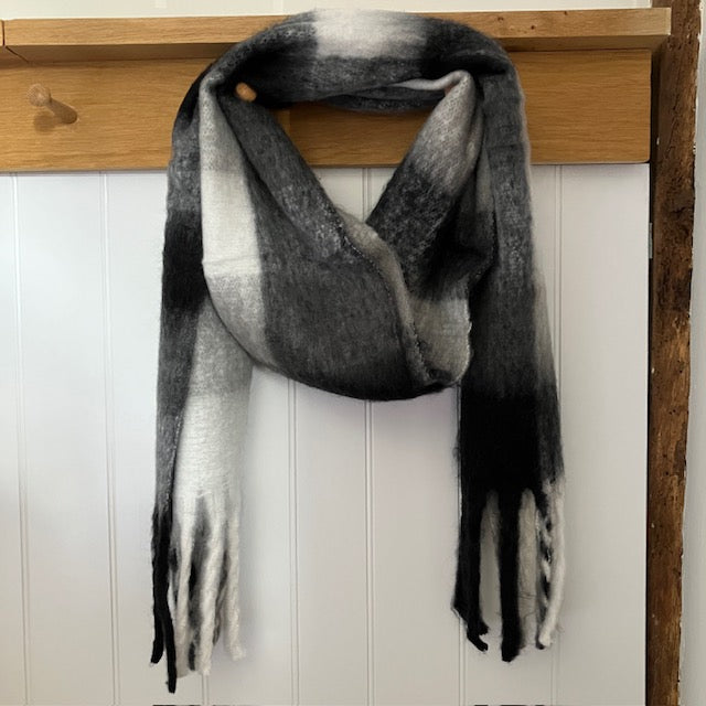 The Bowie Scarf Black, White & Grey is a fabulous, on-trend large check statement scarf 