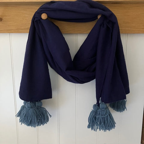 The Camilla Scarf Navy is a wonderfully soft and cosy scarf with fabulous oversized tassels