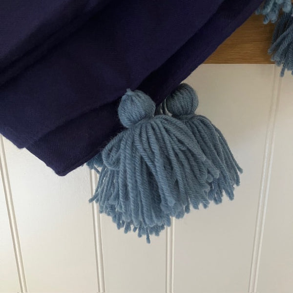 The Camilla Scarf Navy is a wonderfully soft and cosy scarf with fabulous oversized tassels