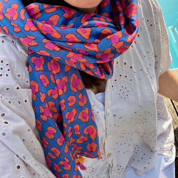 The Cari Scarf Blue is the ideal cosy accessory for your summer