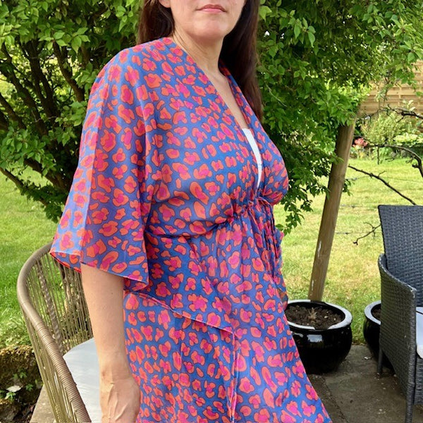 The Cari Kaftan Blue has floaty sleeves and slits up the side for ease of movement