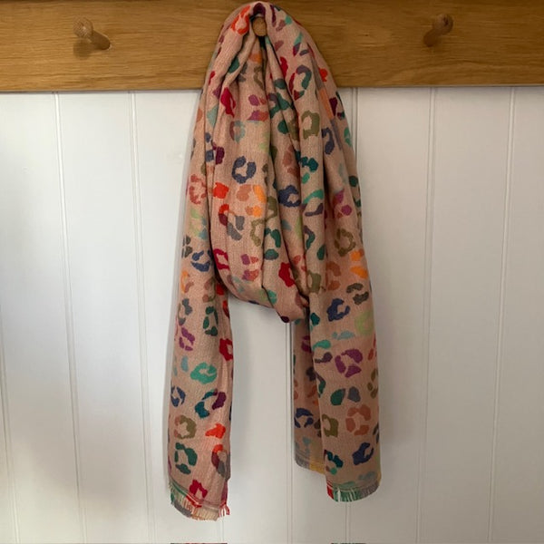 The Cece Pink scarf has a fabulous on trend leopard print pattern in a rainbow of colours, making this a stand out cosy scarf