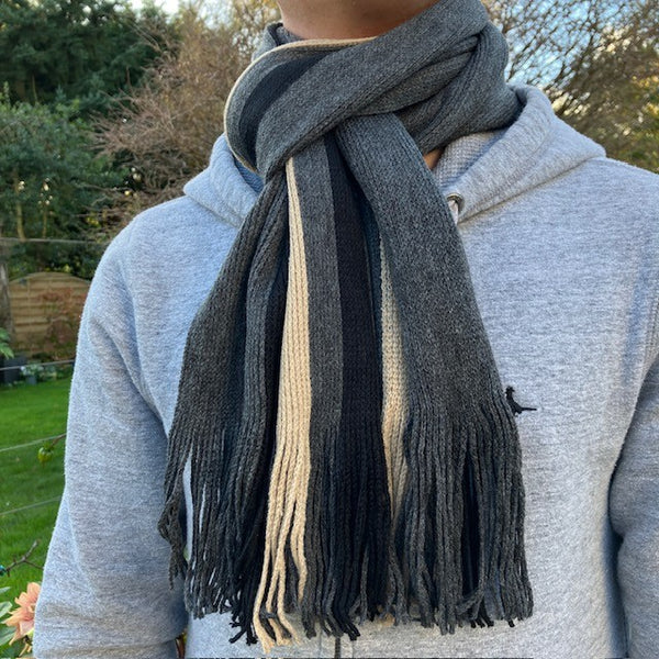 Our Charlie Scarf Grey combines timeless stripes with soft warmth. 