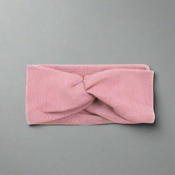 The Chloe Headband Pink is a fabulous on-trend and cosy hair accessory