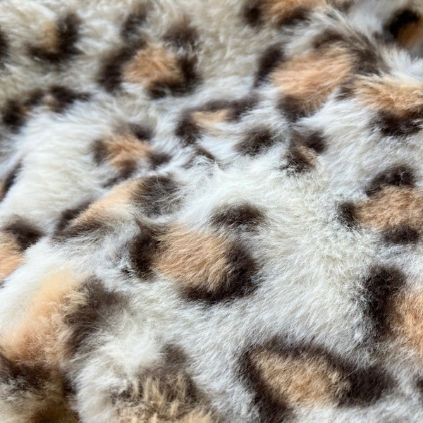 The Cita Snood Leopard Print Cream in this gorgeously soft faux fur is cosy & warm