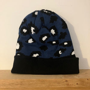 The Cleo Hat Blue Leopard Print is a fabulous bold design that will keep you super warm and cosy this winter