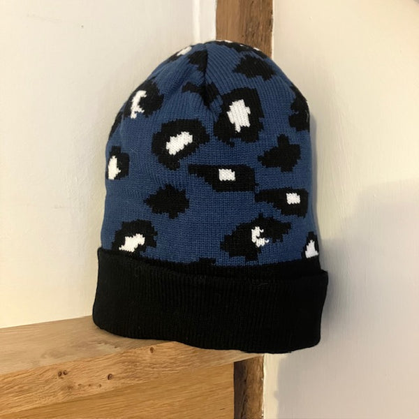 The Cleo Hat Blue Leopard Print is a fabulous bold design that will keep you super warm and cosy this winter