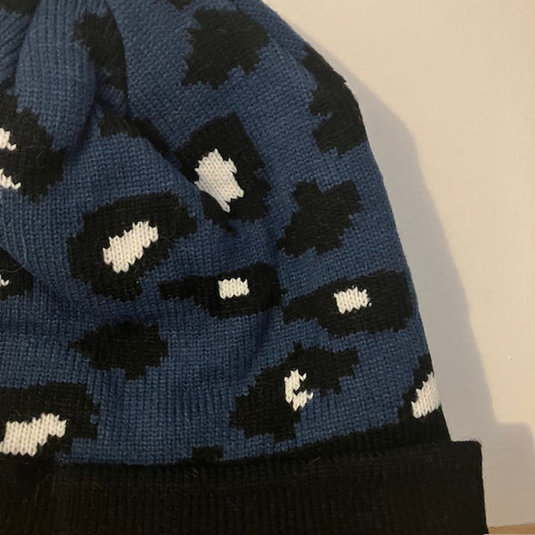 The Cleo Hat Blue Leopard Print is a fabulous bold design that will keep you super warm and cosy this winter