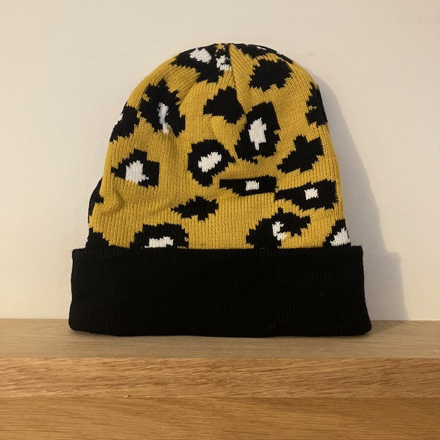 The Cleo Hat Yellow Leopard Print is a fabulous bold design that will keep you super warm and cosy this winter