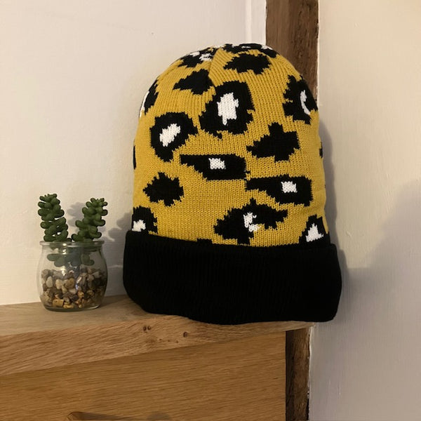 The Cleo Hat Yellow Leopard Print is a fabulous bold design that will keep you super warm and cosy this winter